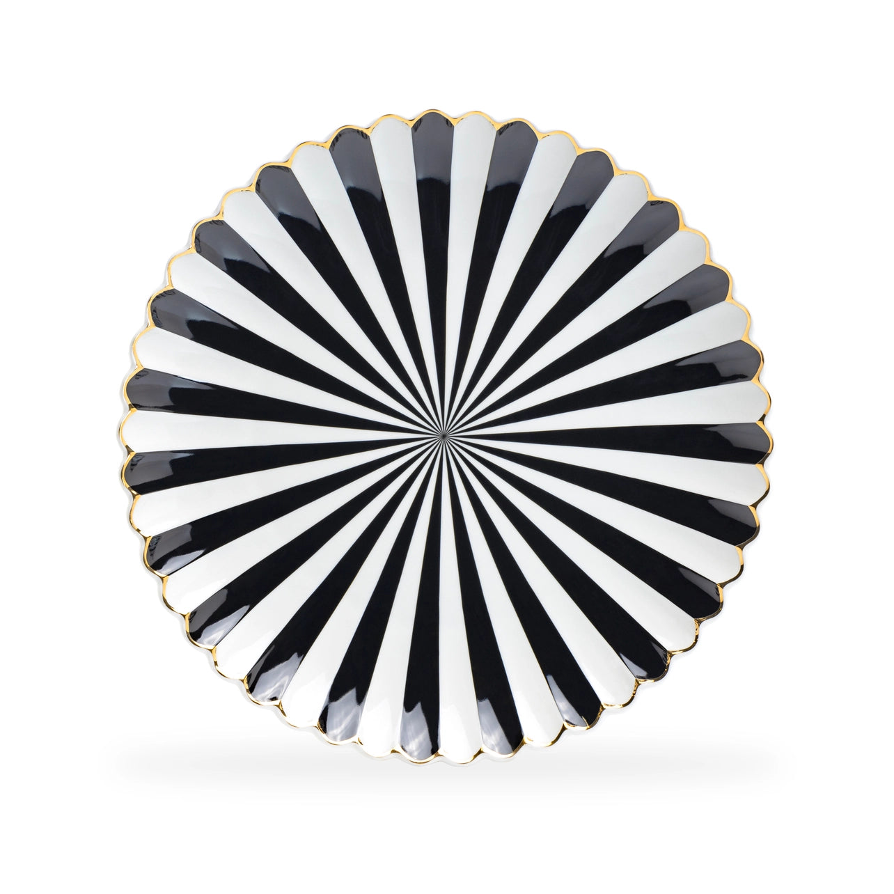 Decorative plate with black and white striped pattern on a white background