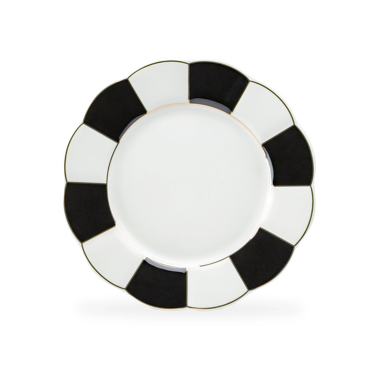 White plate with black and gold rim on a white background