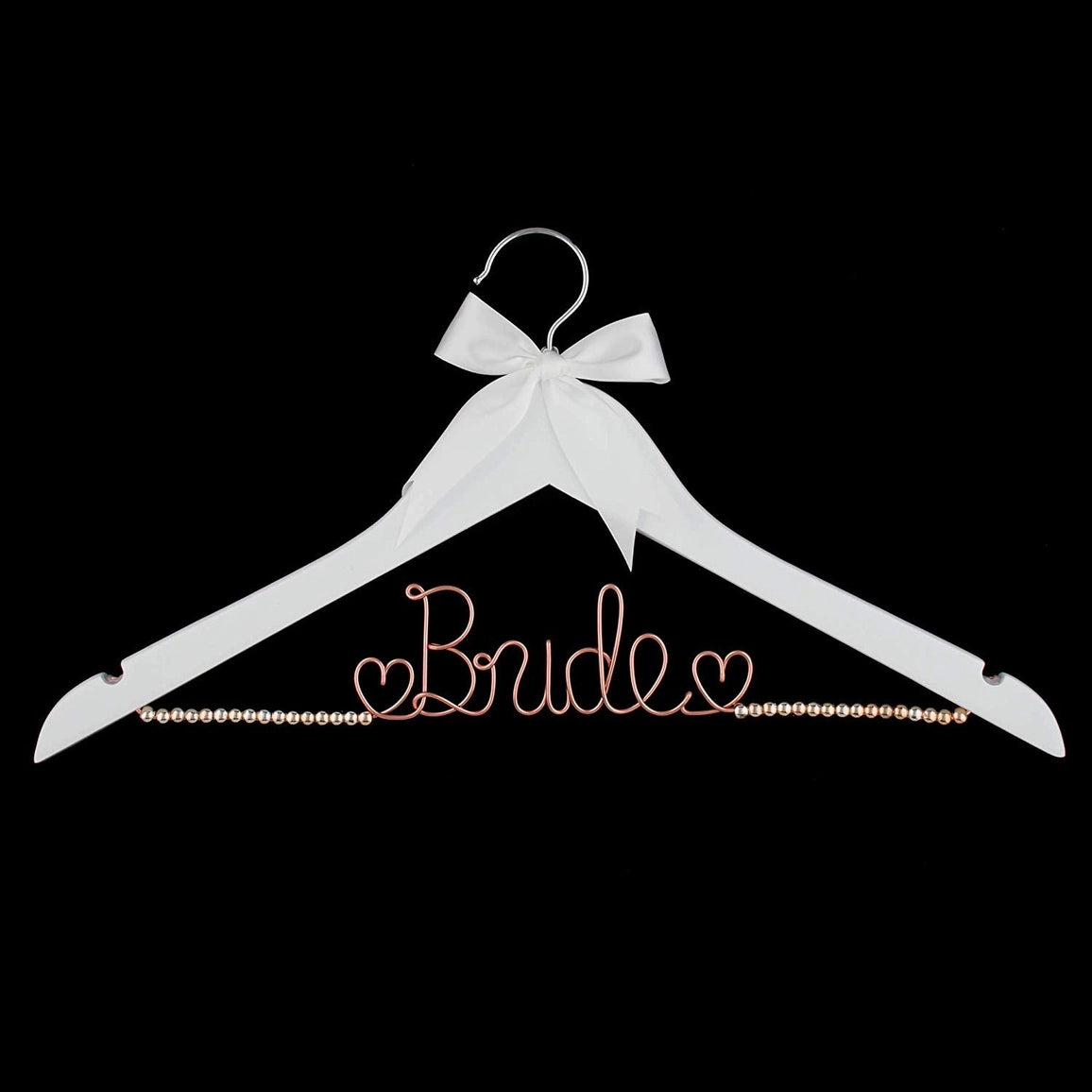 White hanger with 'Bride' text and bow on a black background