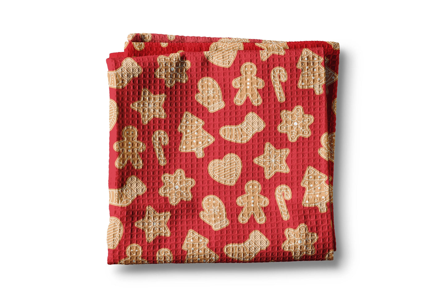 Red waffle-textured towel with gingerbread pattern on a white background