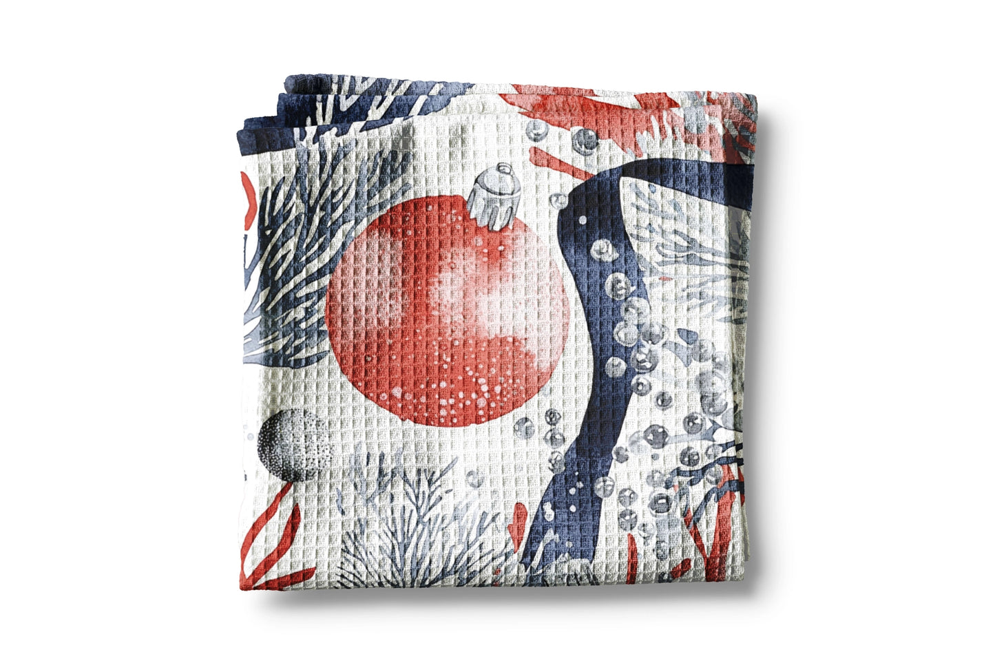 Folded fabric with decorative christmas pattern on a white background