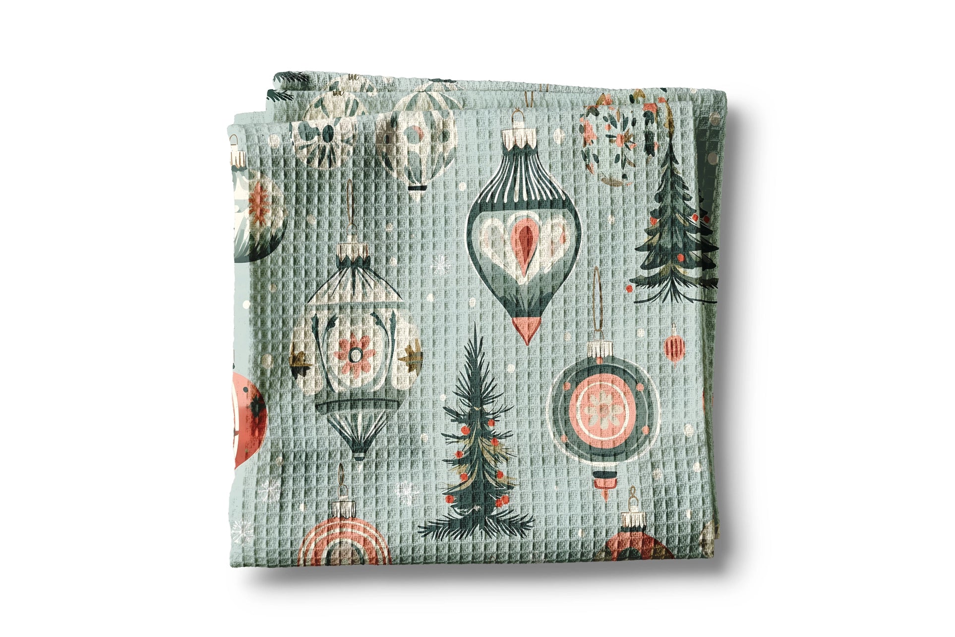 Folded fabric with Christmas-themed pattern on a white background