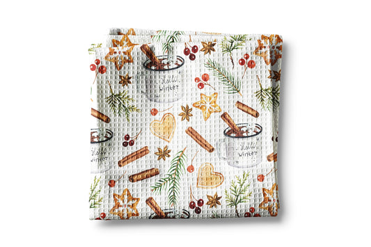 Woven blanket with festive pattern on a white background