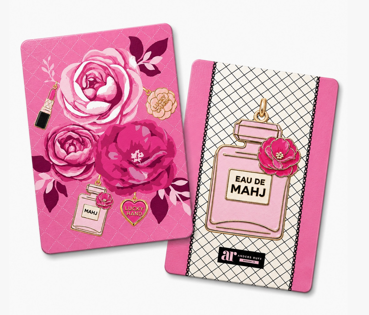 Eau De Mahj Mahjong tile shufflers by Anders Ruff featuring pink florals, perfume bottle artwork and fashion-inspired charm designs.