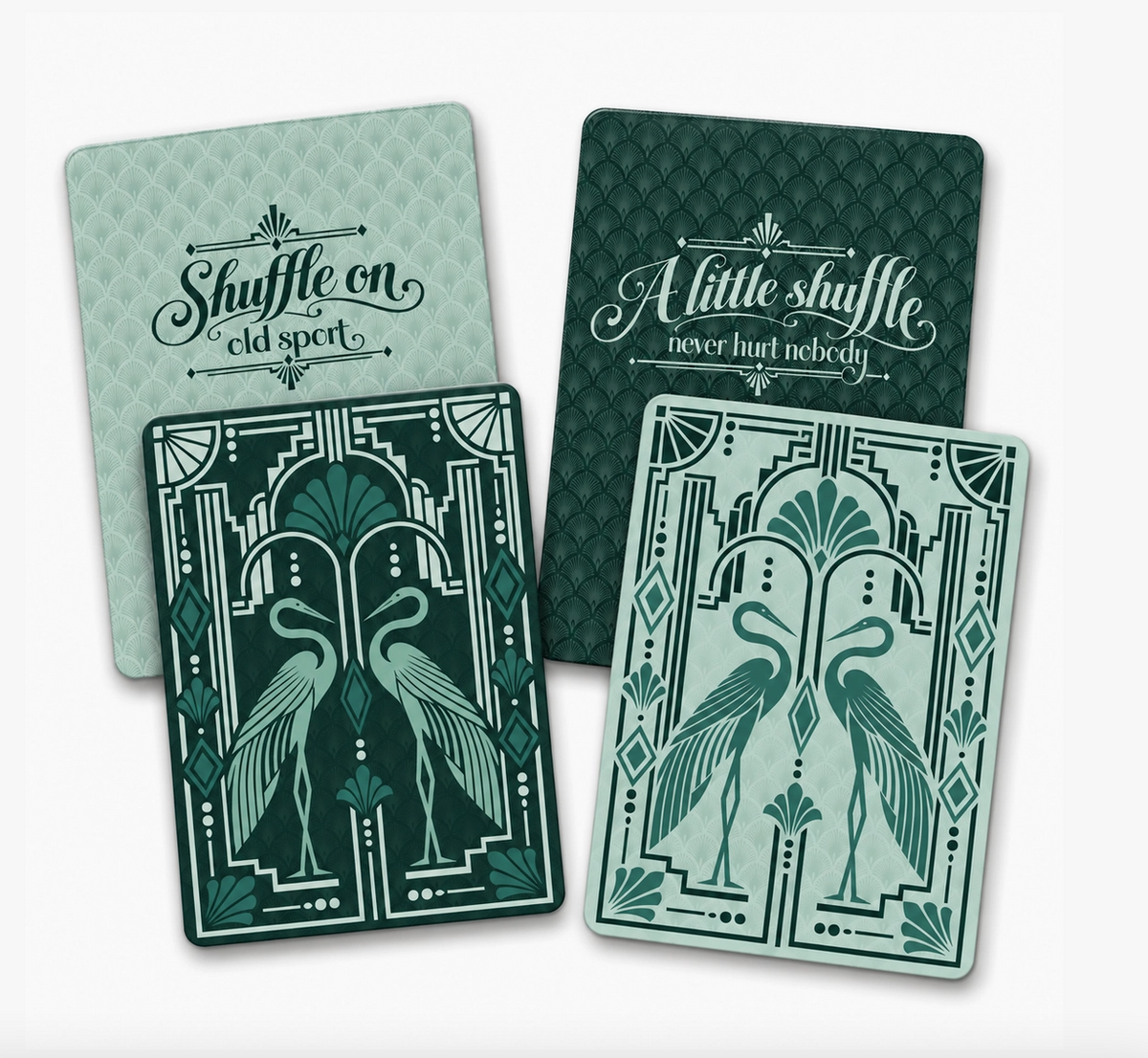 Green Light Gatsby Mahjong tile shufflers set of two in emerald and mint with Art Deco herons, geometric details and game-night sayings.