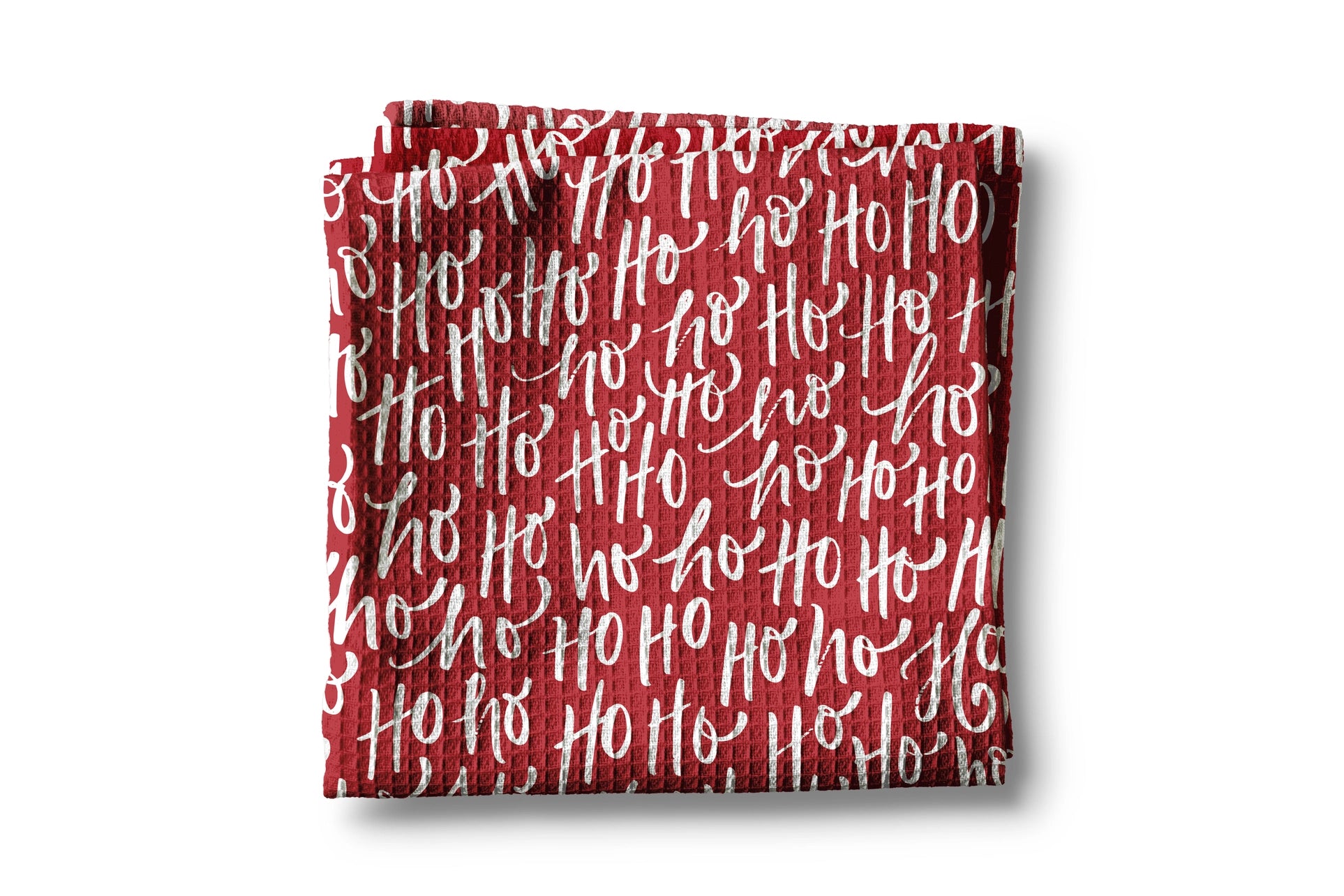 Red fabric with 'Ho Ho Ho' pattern on a white background