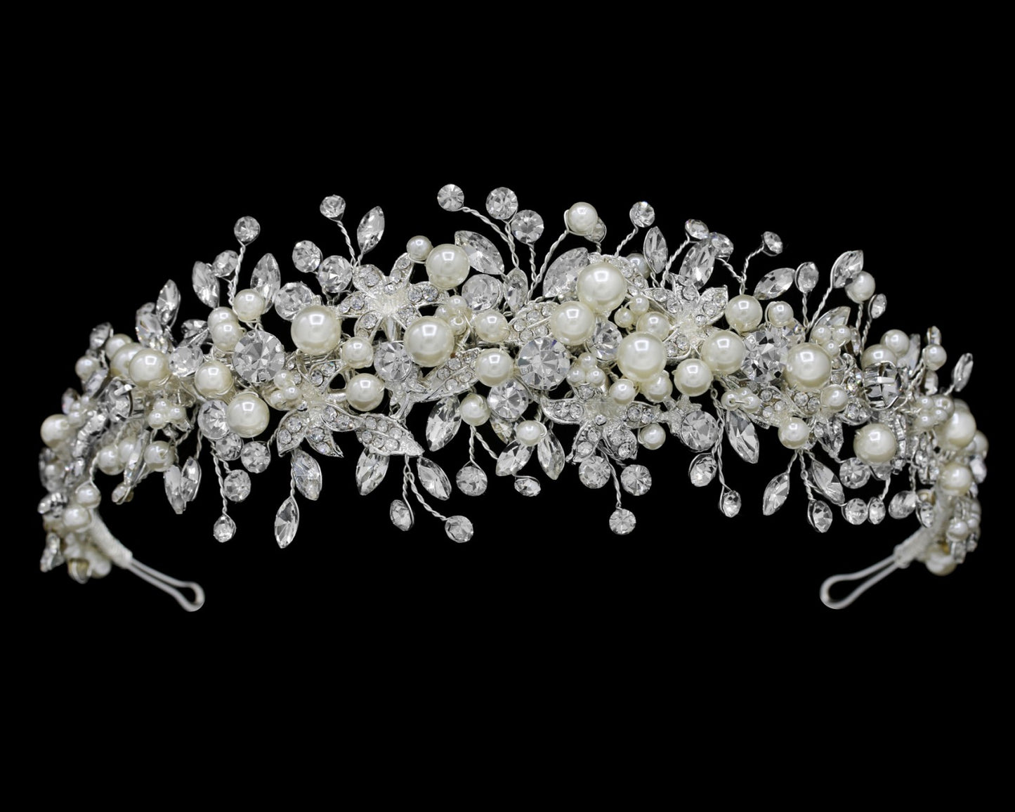 Pearl and crystal tiara on a black background