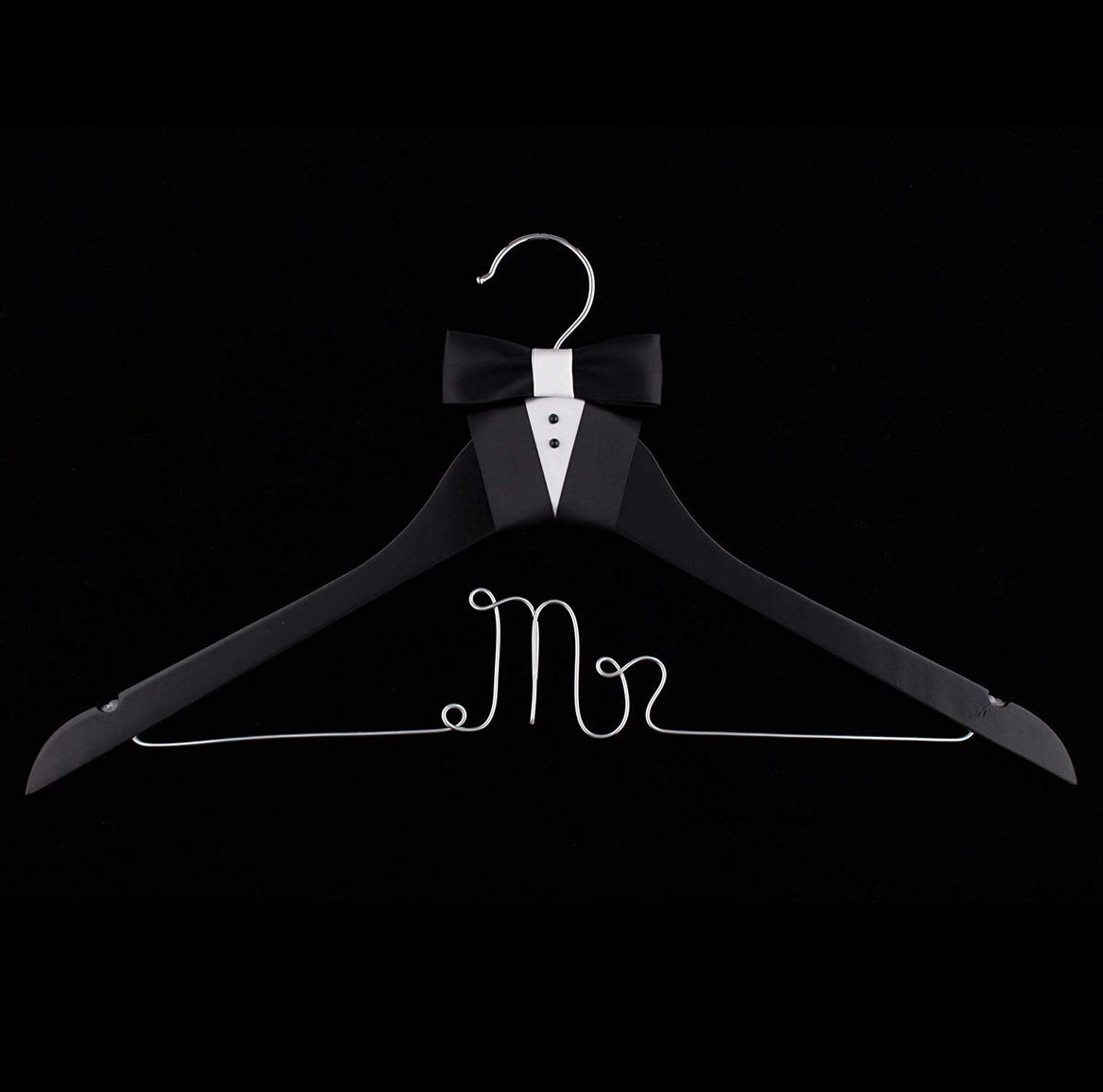 Black hanger with 'Mr' text and bow tie on a black background