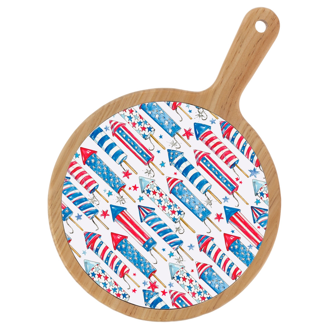 Round wooden cutting board with a patriotic pattern of rockets and stars on a white background