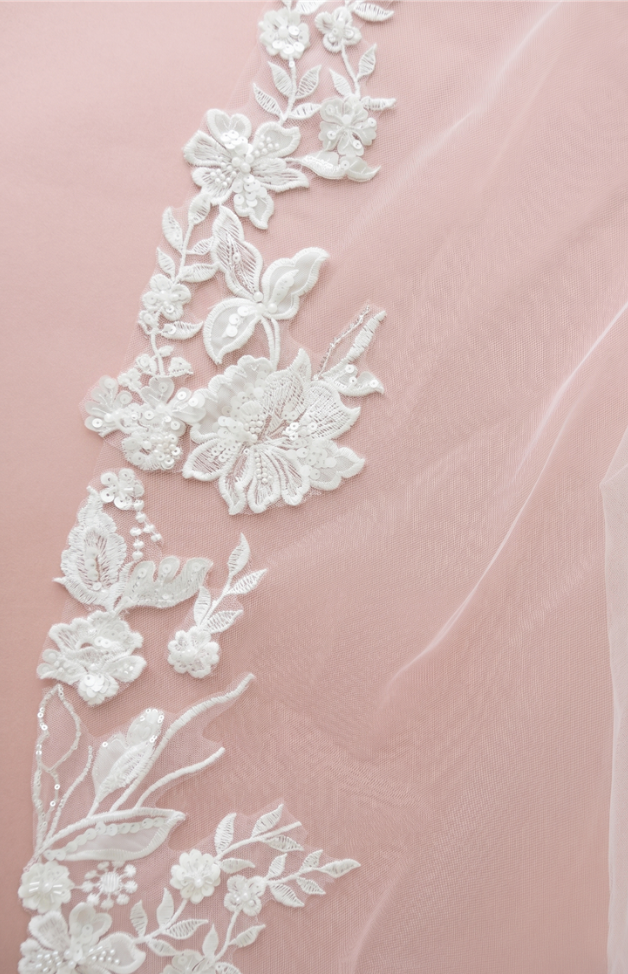 Ivory cathedral wedding veil with embroidered floral lace, vines and delicate sequin details on sheer tulle