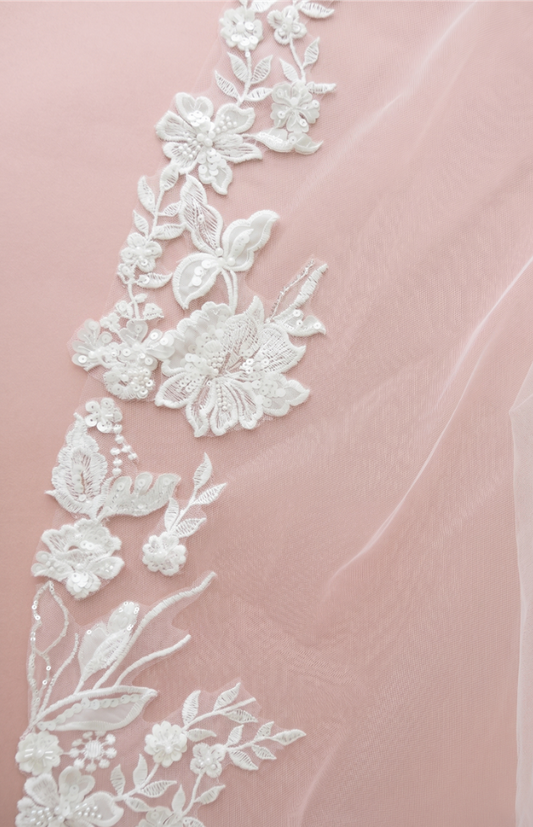 Ivory cathedral wedding veil with embroidered floral lace, vines and delicate sequin details on sheer tulle