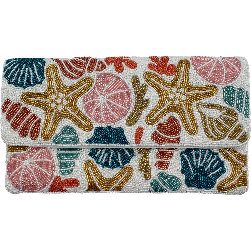 Clutch bag with starfish and shell pattern on a white background