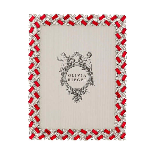 Decorative photo frame with red gemstones and silver accents on a white background, featuring the brand 'Olivia Riegel'.