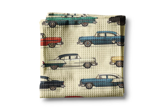 Woven pouch with vintage car pattern on a beige background