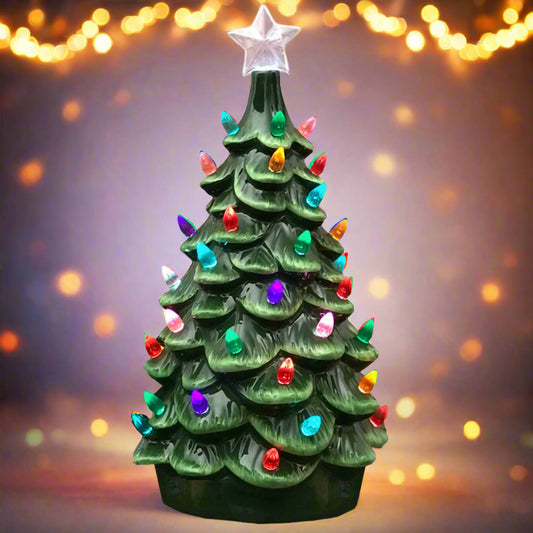 Decorative Christmas tree with colorful lights and a star on a white background