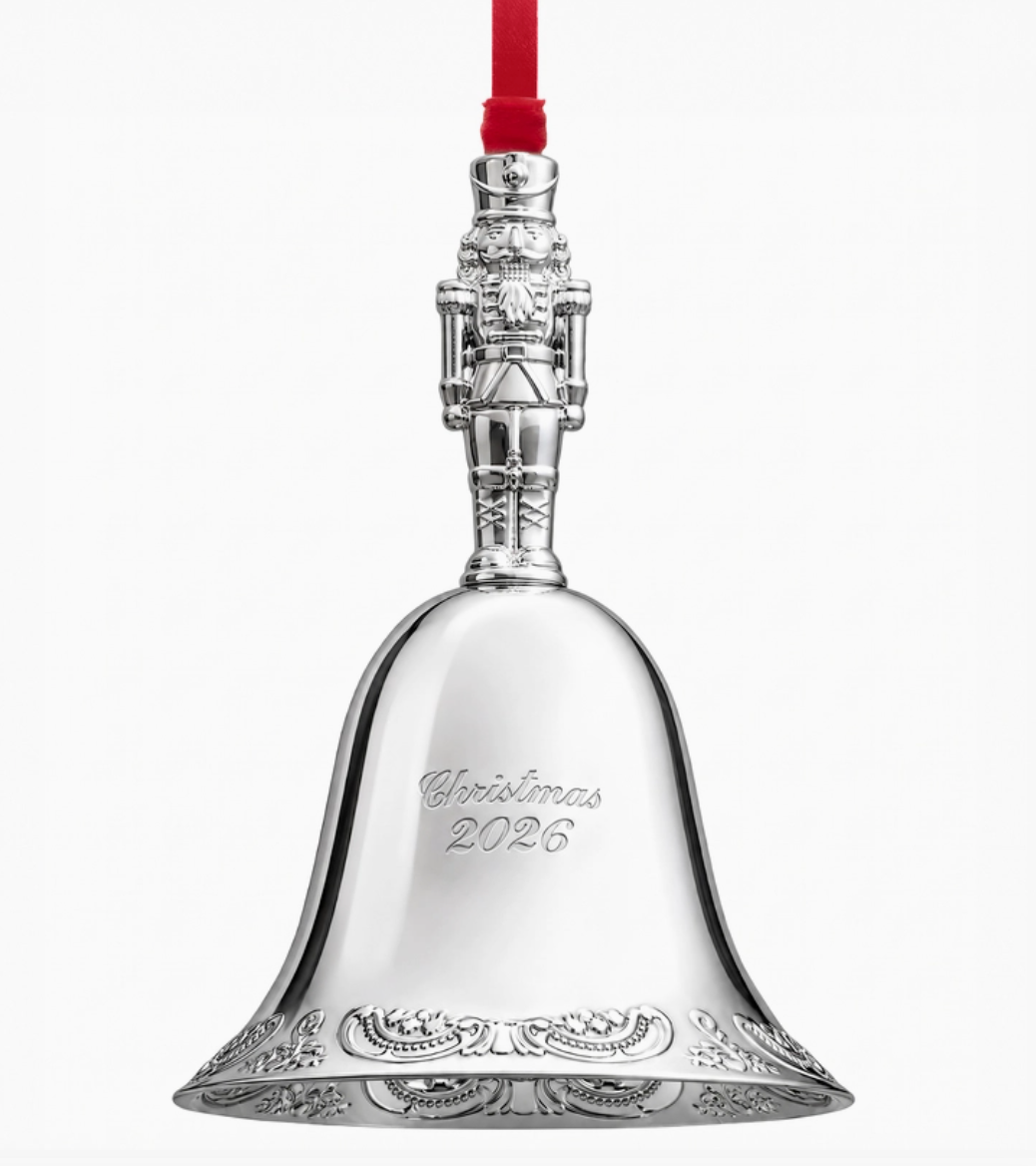 2026 Wallace Grande Baroque silver-plated Christmas bell ornament hanging from a Christmas tree with red ribbon.