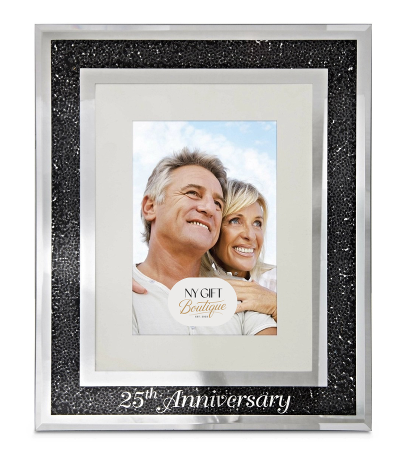 Framed photo of a couple with '25th Anniversary' text on a black glittery border.