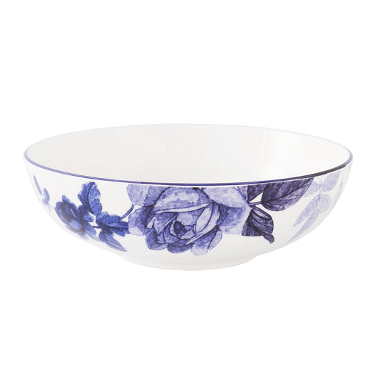 A white ceramic bowl decorated with a blue floral rose pattern, shown against a plain white background.