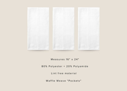 Three white kitchen towels with product details on a beige background
