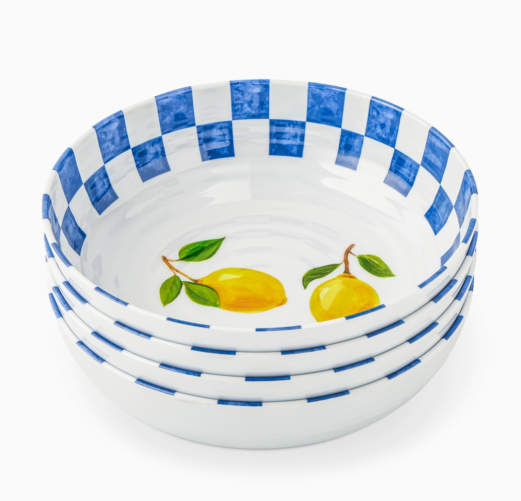 Set of three ceramic bowls with blue checkered rim and lemon design on a white background