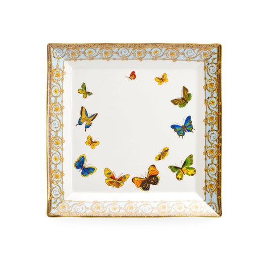Decorative plate with colorful butterfly designs on a white background