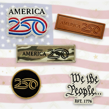 Collection of 'America 250' themed products including patches and a bar on a white background.