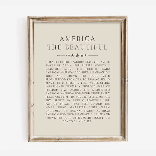 Framed print of 'America the Beautiful' poem on a white background