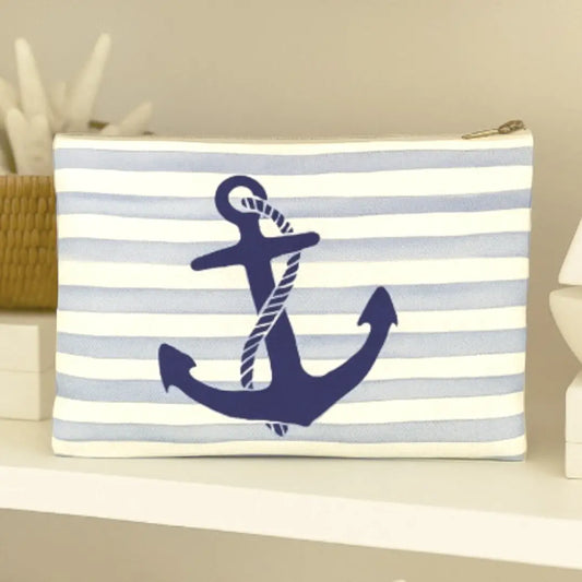 Striped pouch with a navy anchor design on a neutral background