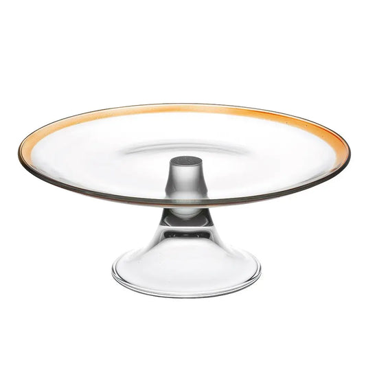 Clear glass cake stand with gold rim on a white background