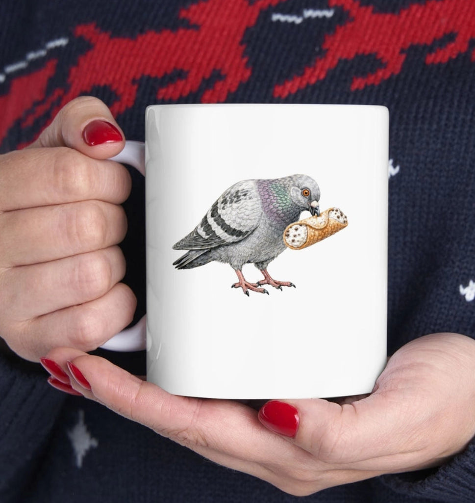 Person holding a mug with a pigeon design, wearing a sweater with deer pattern.