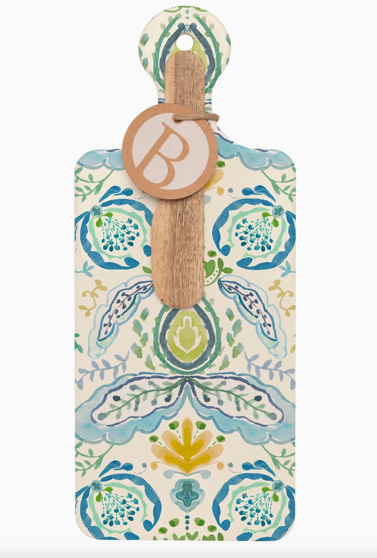 Decorative paddle with a patterned handle on a white background