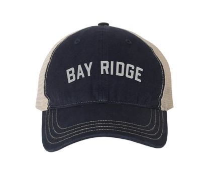 Navy and beige cap with 'Bay Ridge' text on a white background