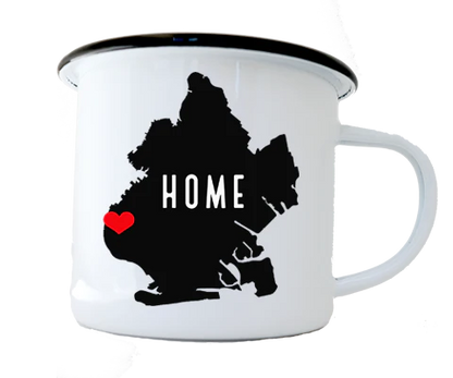 White mug with black silhouette of  Brooklyn with a red heart and the word 'HOME' on a white background