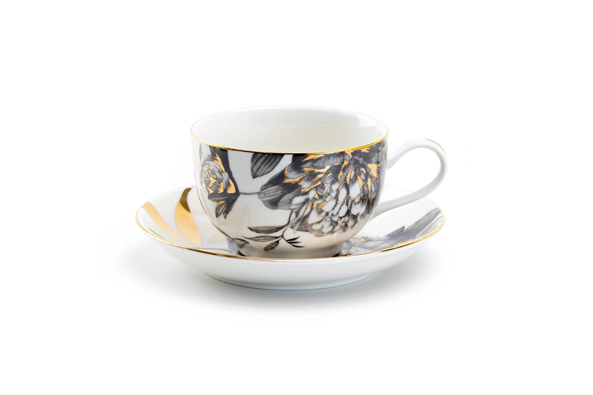 Ceramic cup and saucer with floral design on a white background