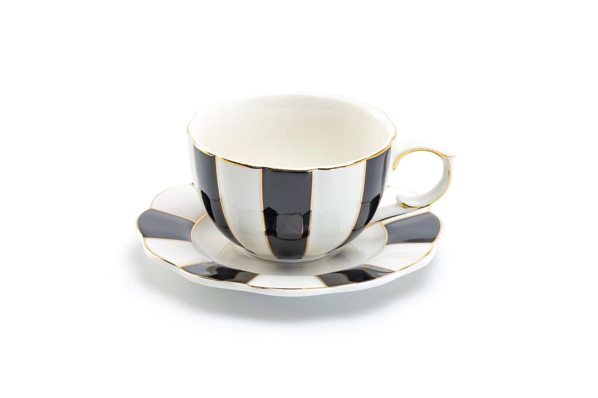 Teacup and saucer with black and white striped design on a white background