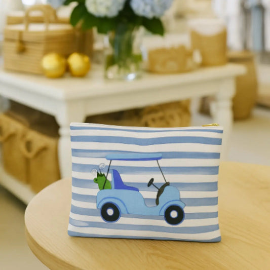 Striped pouch with a golf cart design on a wooden table