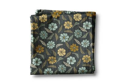 Folded fabric with floral pattern on a white background