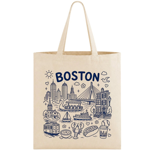 A beige canvas tote bag with a navy blue line art illustration of the Boston skyline, featuring the word 'BOSTON' in bold navy letters, shown against a plain white background.