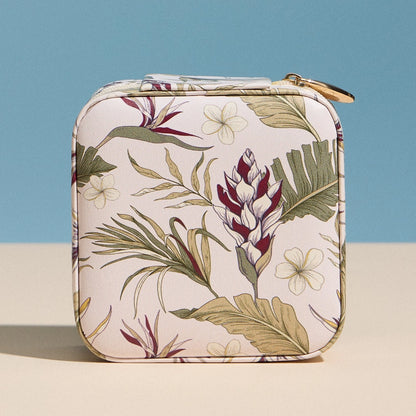 Small rectangular pouch with floral pattern on a blue and beige background