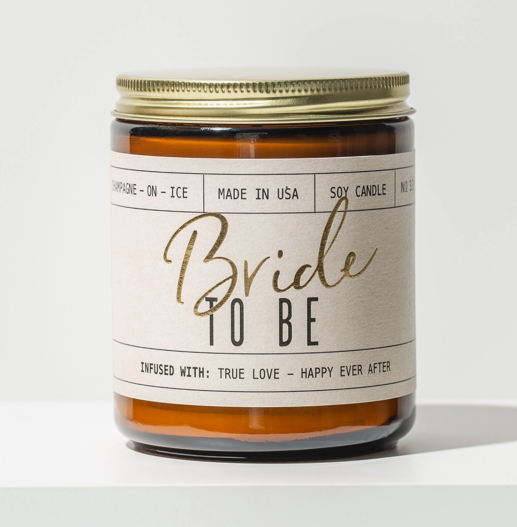 Candle with 'Bride To Be' label on a white background