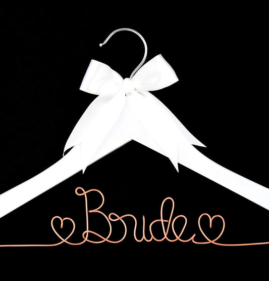 White hanger with a bow and 'Bride' text on a black background