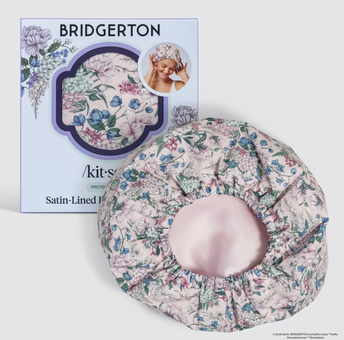 Floral satin-lined pillowcase with packaging featuring 'Bridgerton' branding on a white background. by Kitsch