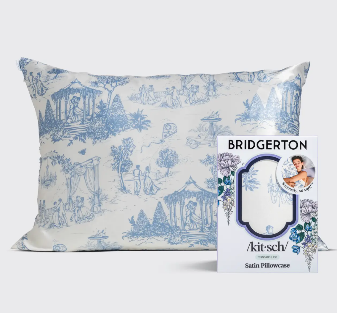 Decorative pillowcase with blue patterns on a white background, featuring the 'Bridgerton' branding.