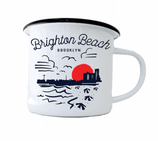 White mug with 'Brighton Beach Brooklyn' design featuring a sunset and cityscape.