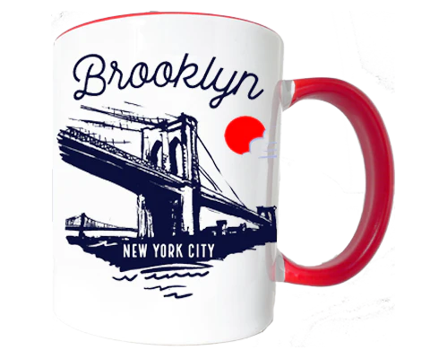 Mug with Brooklyn Bridge design and red handle on a white background