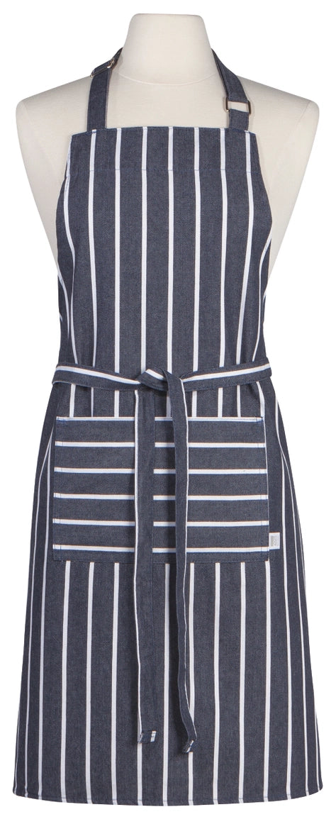 A navy blue apron with white vertical and horizontal stripes, displayed on a cream-colored mannequin torso against a plain white background.