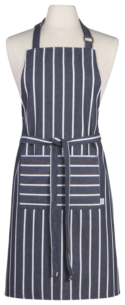 A navy blue apron with white vertical and horizontal stripes, displayed on a cream-colored mannequin torso against a plain white background.