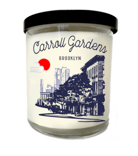 Candle with 'Carroll Gardens, Brooklyn' label on a white background
