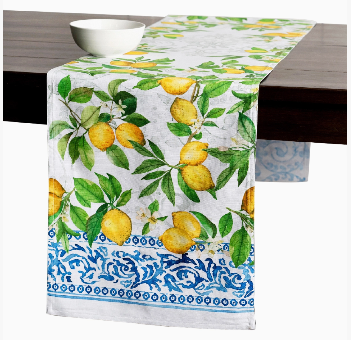 Table runner with lemon and leaf pattern on a table