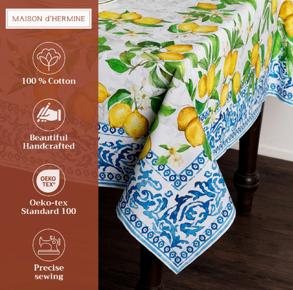 Maison d'Hermine tablecloth with lemon design on a wooden table.